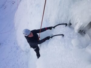 Crsyan ice climbing in Ouray, CO.